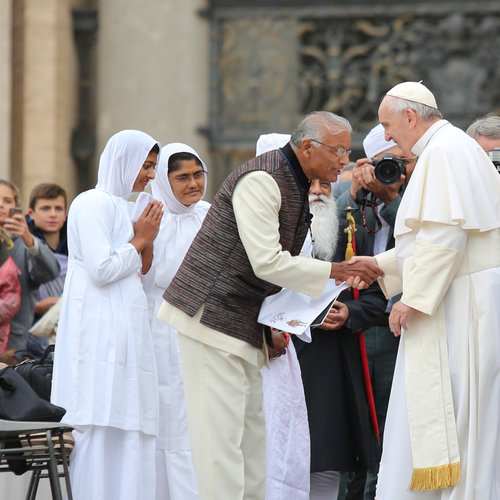 Pope Francis greets an interfaith group in St. Peter's Square for his general audience on Oct. 28, the 50th anniversary of the Second Vatican Council declaration Nostra Aetate, which changed the relationship with people of other faiths.
Pope Francis greets an interfaith group in St. Peter's Square for his general audience on Oct. 28, the 50th anniversary of the Second Vatican Council declaration Nostra Aetate, which changed the relationship with people of other faiths.