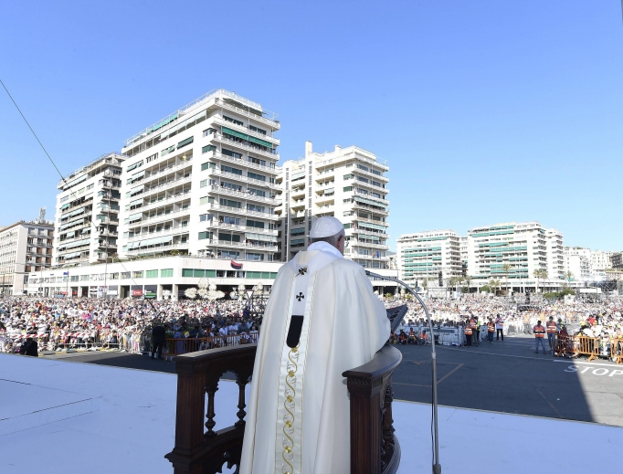 Pope Francis speaks to the crowds gathered during his pastoral visit to the Italian Diocese of Genoa on May 27. Pope Francis speaks to the crowds gathered during his pastoral visit to the Italian Diocese of Genoa on May 27.