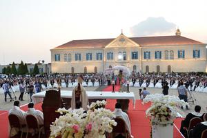 Lebanese Cardinal Bechara Rai, patriarch of Maronite Catholics, celebrates a wedding Mass for 41 couples Sept. 2 at Berke, the Maronite patriarchate north of Beirut. Since the first collective wedding in 2009, a total of 240 couples have been married. Lebanese Cardinal Bechara Rai, patriarch of Maronite Catholics, celebrates a wedding Mass for 41 couples Sept. 2 at Berke, the Maronite patriarchate north of Beirut. Since the first collective wedding in 2009, a total of 240 couples have been married.
