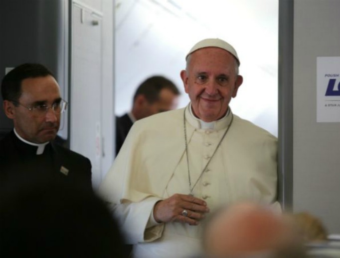 Pope Francis speaks to reporters aboard the papal flight from Krakow to Rome, July 31, 2016. Pope Francis speaks to reporters aboard the papal flight from Krakow to Rome, July 31, 2016.