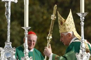 Pope Benedict XVI, with his good friend Cardinal Joachim Meisner of Cologne in the background, arrives for an open-air Mass in Freiburg, Germany, on the last day of a four-day-visit to his homeland of Germany in September 2011.
Pope Benedict XVI, with his good friend Cardinal Joachim Meisner of Cologne in the background, arrives for an open-air Mass in Freiburg, Germany, on the last day of a four-day-visit to his homeland of Germany in September 2011.