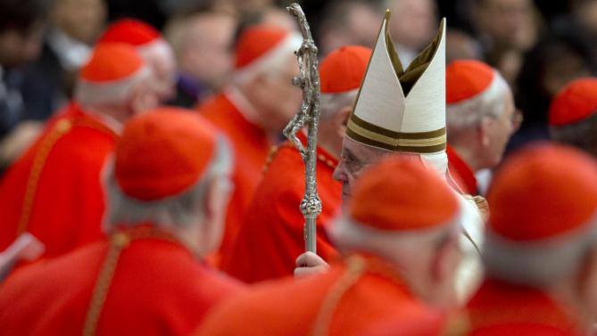 Pope Francis walks among cardinals on Feb. 14 Pope Francis walks among cardinals on Feb. 14