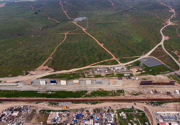 Aerial view of the wall prototypes (c) and the new second line fencing (r) at the U.S.-Mexico border, as seen from Tijuana, Baja California state, Mexico, Feb. 26. Last week, the U.S. Department of Customs and Border Protection said President Donald Trump’s border-wall prototypes are going to be torn down to make way for a second barrier separating California and Mexico. Aerial view of the wall prototypes (c) and the new second line fencing (r) at the U.S.-Mexico border, as seen from Tijuana, Baja California state, Mexico, Feb. 26. Last week, the U.S. Department of Customs and Border Protection said President Donald Trump’s border-wall prototypes are going to be torn down to make way for a second barrier separating California and Mexico.