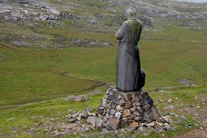 A statue of St. Patrick watches over Mam Ean pass. The mountain in the background is Binn Mhor. A statue of St. Patrick watches over Mam Ean pass. The mountain in the background is Binn Mhor.
