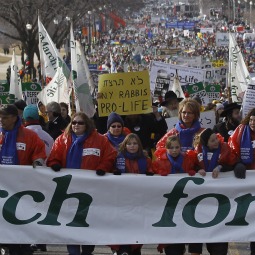 March for Life participants make their way up Constitution Avenue to the Supreme Court building in Washington Jan. 24. The annual pro-life demonstration marks the 1973 Supreme Court decision that legalized abortion across the nation. March for Life participants make their way up Constitution Avenue to the Supreme Court building in Washington Jan. 24. The annual pro-life demonstration marks the 1973 Supreme Court decision that legalized abortion across the nation.