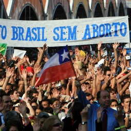 Faithful hold a banner in Portuguese, meaning 'Brazil without abortion' as Pope Benedict XVI presides over Mass opening the 5th general meeting of the Latin American bishops' conference in Aparecida, Brazil, in 2007. Faithful hold a banner in Portuguese, meaning 'Brazil without abortion' as Pope Benedict XVI presides over Mass opening the 5th general meeting of the Latin American bishops' conference in Aparecida, Brazil, in 2007.