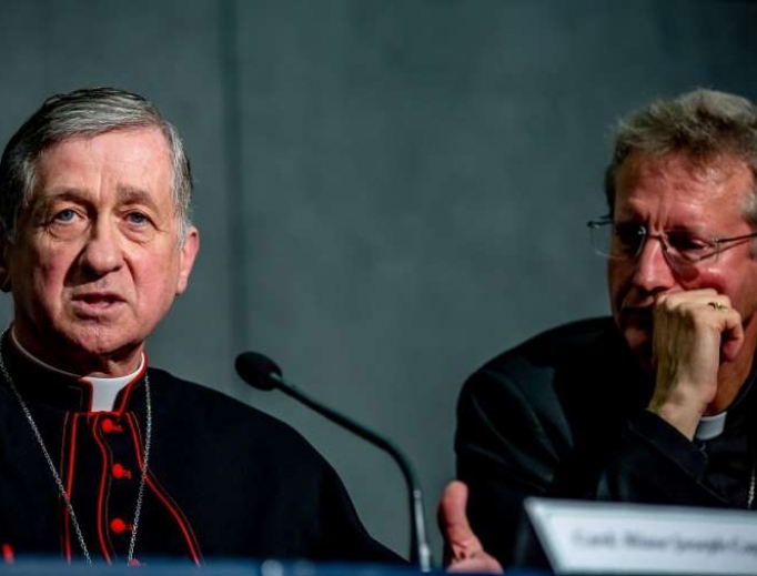 Cardinal Cupich (l) addresses the media Oct. 20 during a break at the synod on youth. He referred to the John Jay Report on the sex abuse scandal, which he said shows that the root of priestly sexual abuse is not homosexuality, but many different causes.
Cardinal Cupich (l) addresses the media Oct. 20 during a break at the synod on youth. He referred to the John Jay Report on the sex abuse scandal, which he said shows that the root of priestly sexual abuse is not homosexuality, but many different causes.