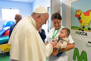 Pope Francis visits a little patient at the Santa Lucia Foundation neuro-rehabilitation center in Rome Sept. 22. Pope Francis visits a little patient at the Santa Lucia Foundation neuro-rehabilitation center in Rome Sept. 22.