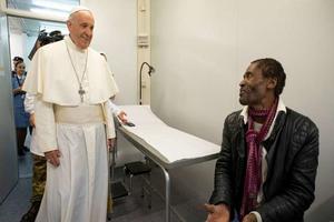 Pope Francis visits with a patient inside a clinic for the poor in Rome, 2019. Pope Francis visits with a patient inside a clinic for the poor in Rome, 2019.