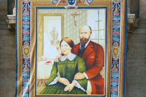 The canonization portrait of Louis and Zélie Martin, parents of St. Thérèse of Lisieux, in St. Peter's Square, on Oct. 16. The canonization portrait of Louis and Zélie Martin, parents of St. Thérèse of Lisieux, in St. Peter's Square, on Oct. 16.