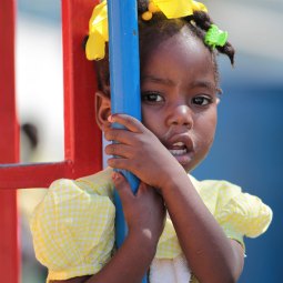 A girl clings to a pole during a break in classes at the Salesian-run National School of Arts and Vocations in Port-au-Prince, Haiti, March 14. The school's mission continues despite the loss of lives and damages it suffered in the January 2010 earthquake. A girl clings to a pole during a break in classes at the Salesian-run National School of Arts and Vocations in Port-au-Prince, Haiti, March 14. The school's mission continues despite the loss of lives and damages it suffered in the January 2010 earthquake.