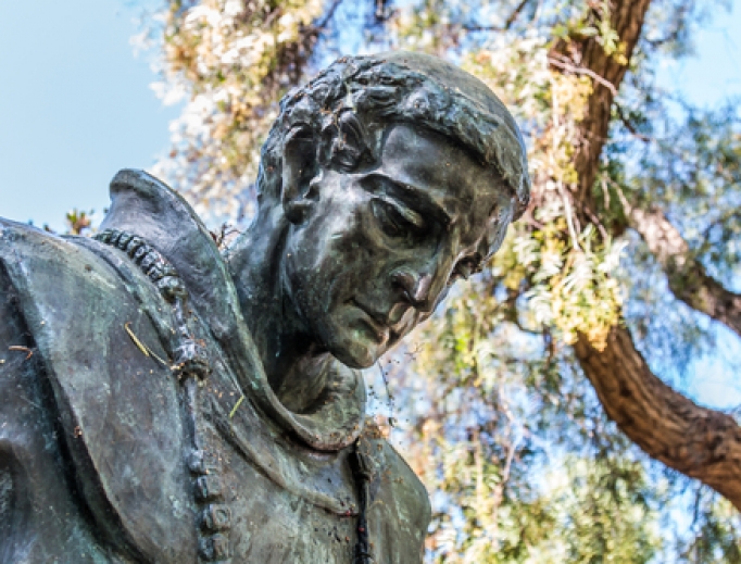 Bowed head of statue of Father Junipero Serra at the Serra Mission Museum, the former site of a fort and the first European settlement on the Pacific Coast. Bowed head of statue of Father Junipero Serra at the Serra Mission Museum, the former site of a fort and the first European settlement on the Pacific Coast.