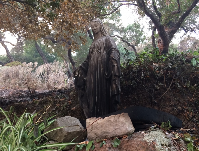 Above, the burned Blessed Mother statue on the Omlin property; below, the fire line is shown, along with other burned acreage. Above, the burned Blessed Mother statue on the Omlin property; below, the fire line is shown, along with other burned acreage.