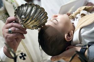 Pope Francis baptizes infants in the Sistine Chapel on the feast of the Baptism of Jesus on Jan. 10, 2016. Pope Francis baptizes infants in the Sistine Chapel on the feast of the Baptism of Jesus on Jan. 10, 2016.