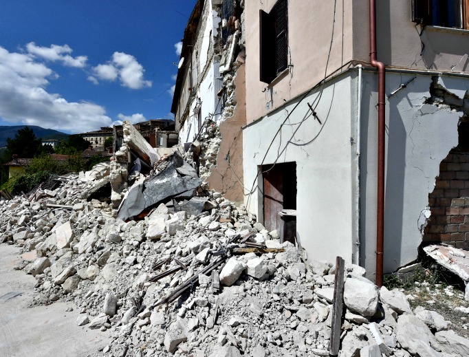Rubble surrounds a damaged building on Aug. 24 in Accumoli, Italy. Central Italy was struck by a powerful, 6.2-magnitude earthquake in the early hours, which has killed at least three people and devastated dozens of mountain villages. Rubble surrounds a damaged building on Aug. 24 in Accumoli, Italy. Central Italy was struck by a powerful, 6.2-magnitude earthquake in the early hours, which has killed at least three people and devastated dozens of mountain villages.