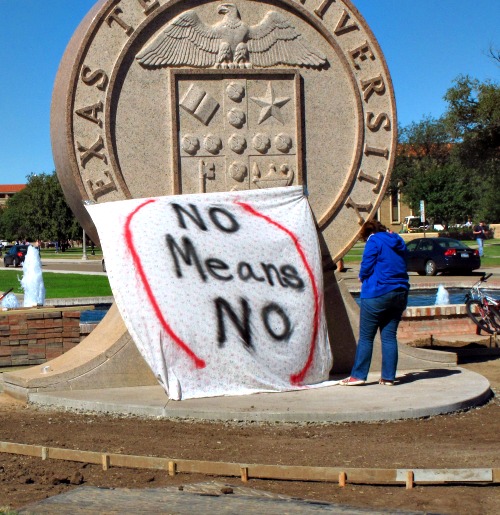 In 2014, Texas Tech freshman Regan Elder helps drape a bed sheet with the message "No means No" over the university's seal on the Lubbock campus. Students put up the bed sheets at three locations to protest what they say is a "rape culture" on campus. Below, Shannon Zurcher is the director of collegiate outreach for the Fellowship of Catholic University Students (Focus). In 2014, Texas Tech freshman Regan Elder helps drape a bed sheet with the message "No means No" over the university's seal on the Lubbock campus. Students put up the bed sheets at three locations to protest what they say is a "rape culture" on campus. Below, Shannon Zurcher is the director of collegiate outreach for the Fellowship of Catholic University Students (Focus).