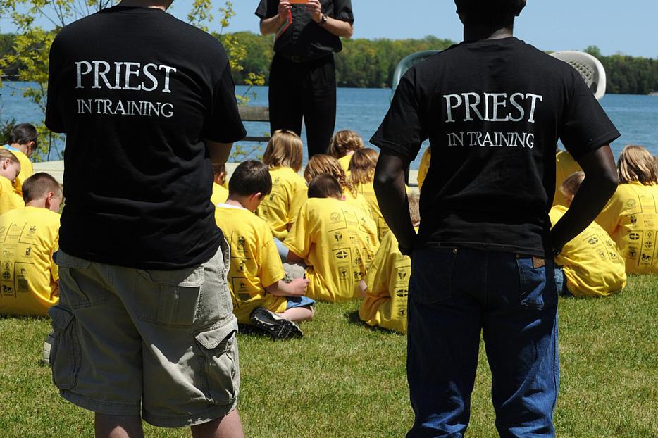 Seminarians Patrick La Pacz and Alvan Amadi listen as Father Tom Long addresses youths gathered at St. Joseph Retreat House in Bailey's Harbor, Wis., during a retreat focusing on Catholic vocations in 2009. Seminarians Patrick La Pacz and Alvan Amadi listen as Father Tom Long addresses youths gathered at St. Joseph Retreat House in Bailey's Harbor, Wis., during a retreat focusing on Catholic vocations in 2009.