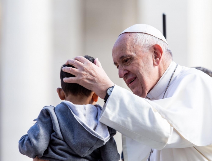 Pope Francis blesses a child during his Wednesday General Audience on May 1, 2019. Pope Francis blesses a child during his Wednesday General Audience on May 1, 2019.