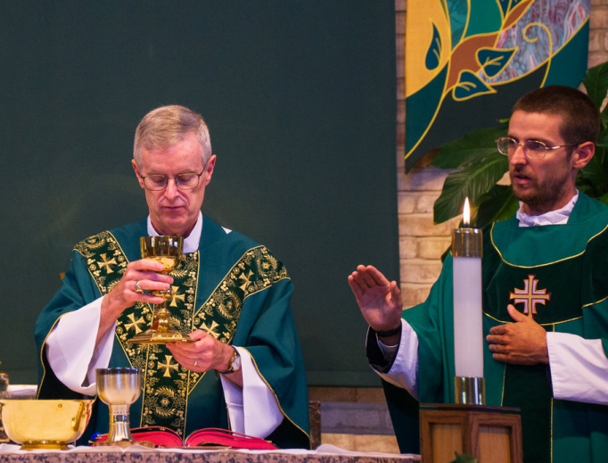 Fathers Peter (c) and Andrew Infanger (r) are biological father and son. Here, they concelebrate Father Peter’s Mass of thanksgiving this past Father’s Day at St. Matthew Church in Glendale Heights, Illinois. Fathers Peter (c) and Andrew Infanger (r) are biological father and son. Here, they concelebrate Father Peter’s Mass of thanksgiving this past Father’s Day at St. Matthew Church in Glendale Heights, Illinois.