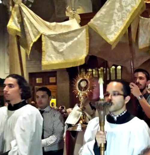 Father Michael Drea leads the Eucharistic procession in the Church of St. Paul in Harvard Square, Cambridge, Mass. Father Michael Drea leads the Eucharistic procession in the Church of St. Paul in Harvard Square, Cambridge, Mass.