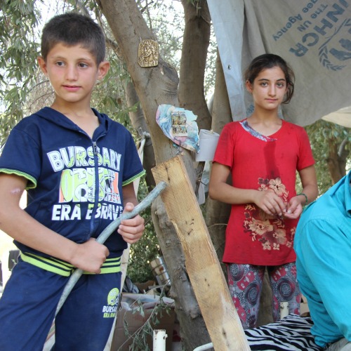 Refugee children from Iraq who have take shelter at the Syro-Catholic Mrtshmony Shrine in Erbil, Iraq. Refugee children from Iraq who have take shelter at the Syro-Catholic Mrtshmony Shrine in Erbil, Iraq.