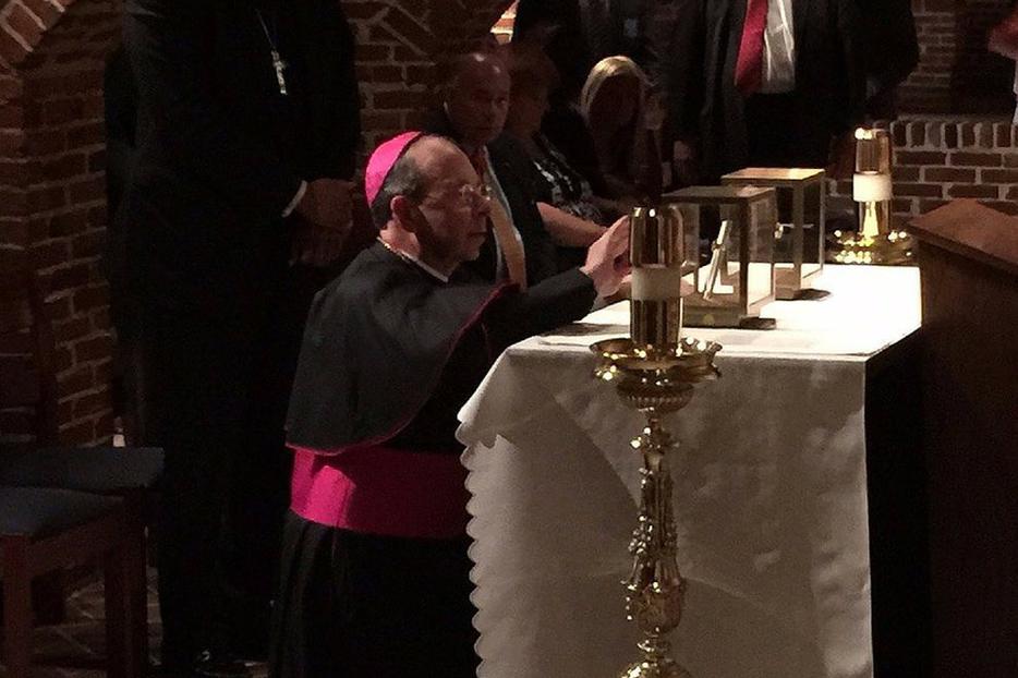 Archbishop William Lori venerates the relics of St. Thomas More and Josh Fisher at the basilica in Baltimore on June 21. Archbishop William Lori venerates the relics of St. Thomas More and Josh Fisher at the basilica in Baltimore on June 21.