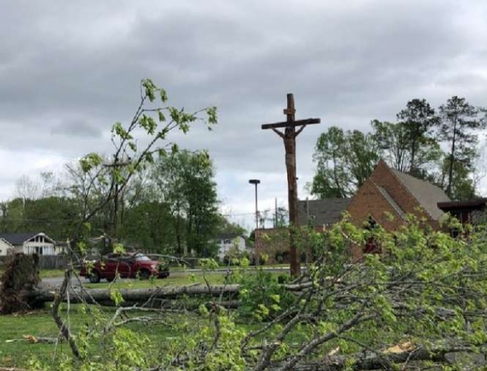 A crucifix outside a Tennessee church after storms over Easter, 2020. A crucifix outside a Tennessee church after storms over Easter, 2020.