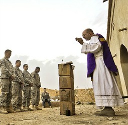U.S. Army chaplain Father Carl Subler celebrates Mass for soldiers in Badula Qulp, Afghanistan, on Feb. 21, 2010. U.S. Army chaplain Father Carl Subler celebrates Mass for soldiers in Badula Qulp, Afghanistan, on Feb. 21, 2010.