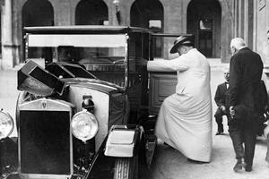 Pope Pius XI steps into a Bianchi Tipo 20 automobile in May 1931. Pope Pius XI steps into a Bianchi Tipo 20 automobile in May 1931.