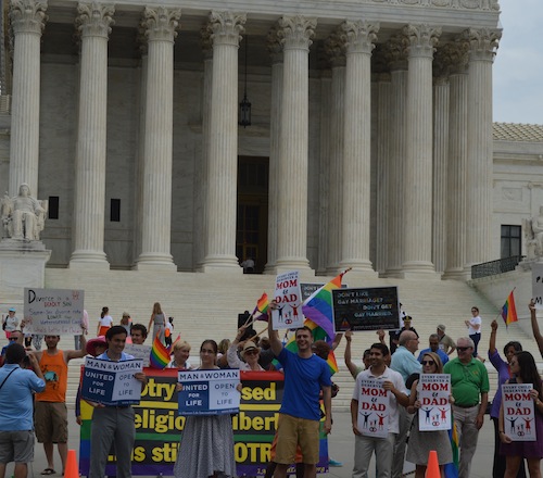 Supporters of traditional marriage and same-sex 'marriage' activists face off in front of the Supreme Court during the March for Marriage in Washington on June 19, 2014. Supporters of traditional marriage and same-sex 'marriage' activists face off in front of the Supreme Court during the March for Marriage in Washington on June 19, 2014.