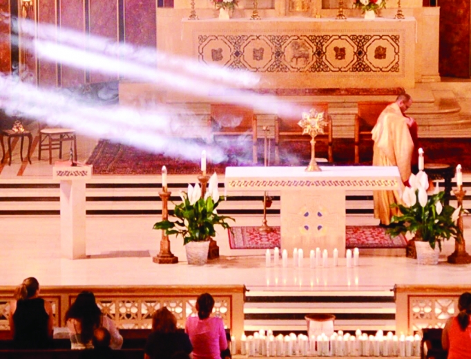 ‘Light for Love’ draws the faithful for quiet prayer before the Blessed Sacrament at St. James parish in Lakewood, Ohio. ‘Light for Love’ draws the faithful for quiet prayer before the Blessed Sacrament at St. James parish in Lakewood, Ohio.