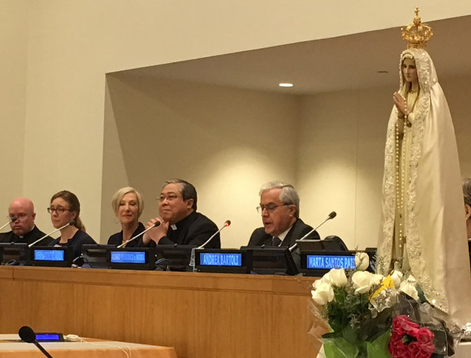 Above, panel discussion at the United Nations Pilgrim Virgin Statue event: Father Roger Landry (far left), of Holy See’s Permanent Observer Mission at the U.N.; Johnnette Benkovic of EWTN; and Archbishop Bernardito Auza, the apostolic nuncio leading the Holy See’s Permanent Observer Mission to the United Nations. Below, the crowd gathered at St. Patrick's Cathedral and the Missionaries of Charity venerating the statue Above, panel discussion at the United Nations Pilgrim Virgin Statue event: Father Roger Landry (far left), of Holy See’s Permanent Observer Mission at the U.N.; Johnnette Benkovic of EWTN; and Archbishop Bernardito Auza, the apostolic nuncio leading the Holy See’s Permanent Observer Mission to the United Nations. Below, the crowd gathered at St. Patrick's Cathedral and the Missionaries of Charity venerating the statue