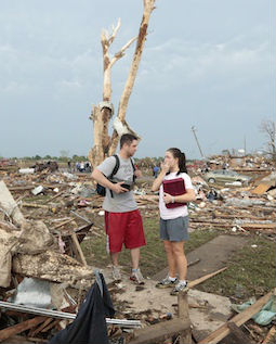 Carlos and Kim Caudillo stand in the debris of their home after a powerful tornado ripped through the area on May 20 in Moore, Okla. Carlos and Kim Caudillo stand in the debris of their home after a powerful tornado ripped through the area on May 20 in Moore, Okla.