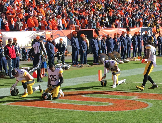 Pittsburgh Steelers kneel for higher reasons before a playoff game in Denver on January 17, 2016. Pittsburgh Steelers kneel for higher reasons before a playoff game in Denver on January 17, 2016.