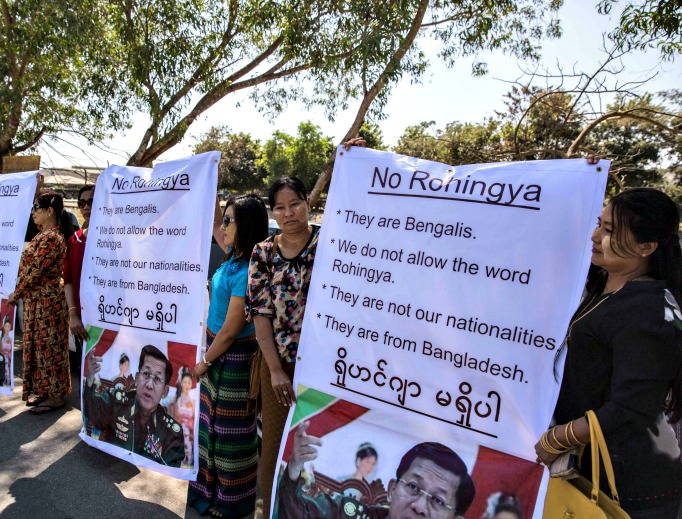 Ma Ba Tha Buddhists protest the use of the word 'Rohingya' as a Rakhine donation ship from Malaysia arrives Feb. 9 in Yangon, Burma. The Rohingya aid ship, Nautical Aliya, landed at Thilawa port near Yangon while making its way to the Rohingya refugee camps in Myanmar and Bangladesh, bearing 2,300 tons of food, clothes and medical supplies for the Rohingyas in the two countries. Below, Cardinal Charles Maung Bo of Myanmar has spoken with Pope Francis on alleviating the suffering of this Muslim minority. Ma Ba Tha Buddhists protest the use of the word 'Rohingya' as a Rakhine donation ship from Malaysia arrives Feb. 9 in Yangon, Burma. The Rohingya aid ship, Nautical Aliya, landed at Thilawa port near Yangon while making its way to the Rohingya refugee camps in Myanmar and Bangladesh, bearing 2,300 tons of food, clothes and medical supplies for the Rohingyas in the two countries. Below, Cardinal Charles Maung Bo of Myanmar has spoken with Pope Francis on alleviating the suffering of this Muslim minority.