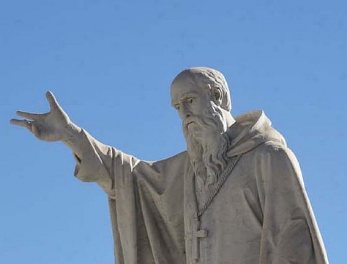 Above, a statue of St. Benedict inn Italy Above, a statue of St. Benedict inn Italy