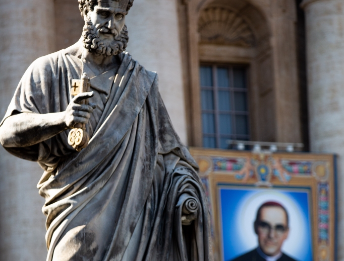 A special banner with the official portrait of Archbishop Óscar Romero hangs on the facade of St. Peter's Basilica before the Oct. 14 canonization Mass in which he and six others were officially declared saints.
A special banner with the official portrait of Archbishop Óscar Romero hangs on the facade of St. Peter's Basilica before the Oct. 14 canonization Mass in which he and six others were officially declared saints.
