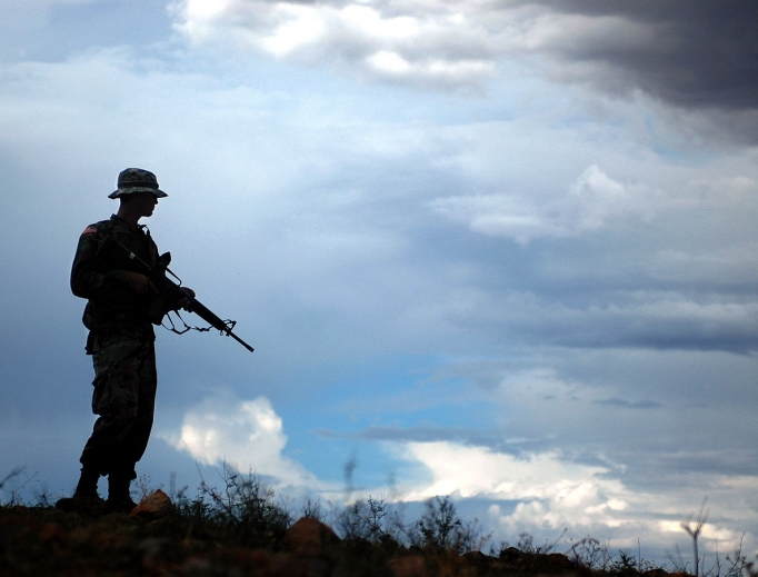 A U.S. Army National Guard member working with the U.S. Border Patrol in Arizona in July 2006. A U.S. Army National Guard member working with the U.S. Border Patrol in Arizona in July 2006.