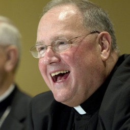 New York Archbishop Timothy Dolan addresses members of the media Nov. 16 at the U.S. Conference of Catholic Bishops' annual fall meeting in Baltimore. New York Archbishop Timothy Dolan addresses members of the media Nov. 16 at the U.S. Conference of Catholic Bishops' annual fall meeting in Baltimore.
