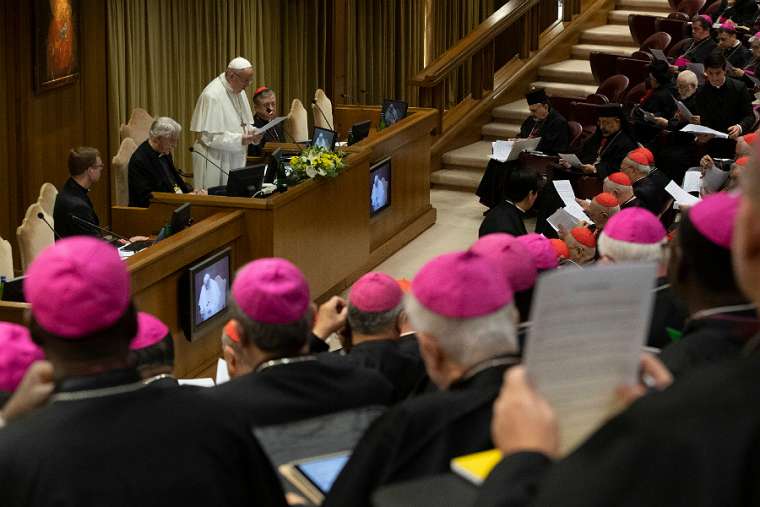 Pope Francis presides at the meeting on protection of minors in the Church in the Vatican's New Synod Hall Feb. 21. Pope Francis presides at the meeting on protection of minors in the Church in the Vatican's New Synod Hall Feb. 21.