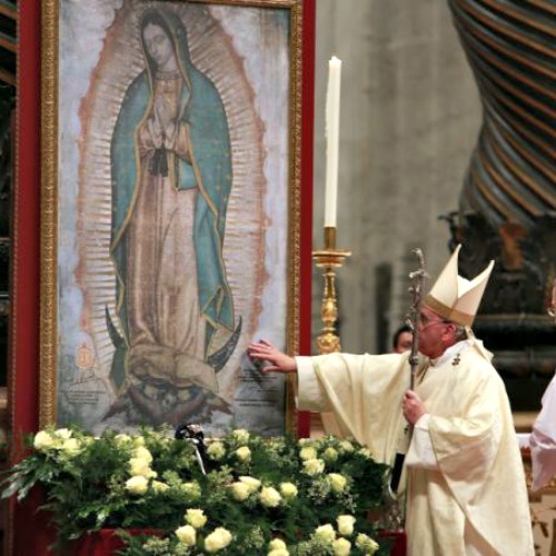Pope Francis touches an image of Our Lady of Guadalupe at St. Peter's Basilica Dec. 12, 2014. Pope Francis touches an image of Our Lady of Guadalupe at St. Peter's Basilica Dec. 12, 2014.
