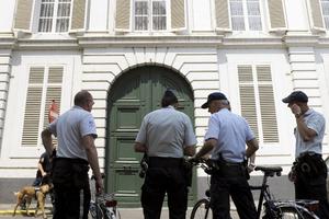 Police officers stand outside the residence of the archbishop of Mechelen-Brussels in Mechelen, Belgium, June 24. Belgian investigators searched Church headquarters in Belgium, the archbishop's residence as well as the home of Cardinal Godfried Danneels as part of an investigation into alleged priestly sexual abuse. Police officers stand outside the residence of the archbishop of Mechelen-Brussels in Mechelen, Belgium, June 24. Belgian investigators searched Church headquarters in Belgium, the archbishop's residence as well as the home of Cardinal Godfried Danneels as part of an investigation into alleged priestly sexual abuse.