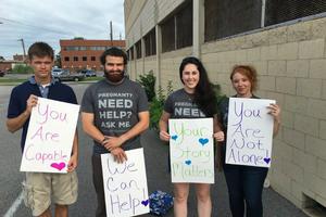 Kasey Schwartz (second from right), a graduate student at Southern Illinois University, participates with three other young people in the first-ever National Pro-Life Generation Sidewalk Day on Aug. 6. Kasey Schwartz (second from right), a graduate student at Southern Illinois University, participates with three other young people in the first-ever National Pro-Life Generation Sidewalk Day on Aug. 6.