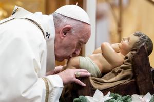 Pope Francis kisses the feet of the infant Jesus, January 2, 2020. Pope Francis kisses the feet of the infant Jesus, January 2, 2020.
