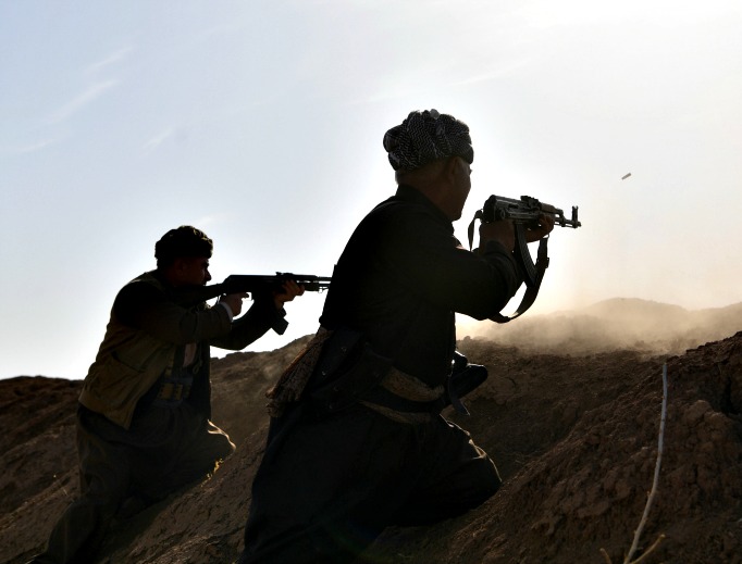 Kurdish peshmerga fighters fire at an ISIS position during an assault to recapture the village of Tiskharab, near Mosul, Iraq, on Oct. 20. Kurdish and Iraqi forces, supported by numerous countries, including Britain and the USA, have continued their advance towards towards Iraq's second-largest city of Mosul, which has been held by Islamic State militants since 2014. Kurdish peshmerga fighters fire at an ISIS position during an assault to recapture the village of Tiskharab, near Mosul, Iraq, on Oct. 20. Kurdish and Iraqi forces, supported by numerous countries, including Britain and the USA, have continued their advance towards towards Iraq's second-largest city of Mosul, which has been held by Islamic State militants since 2014.