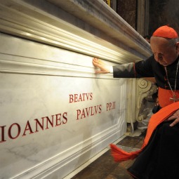 Polish Cardinal Stanislaw Dziwisz prays at the new tomb of late Pope John Paul II in St. Peter's Basilica at the Vatican May 3. Polish Cardinal Stanislaw Dziwisz prays at the new tomb of late Pope John Paul II in St. Peter's Basilica at the Vatican May 3.