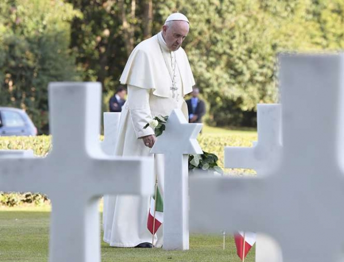 Pope Francis visits graves at the Sicily-Rome American Cemetery in Nettuno, Italy, Nov. 2, 2017. Pope Francis visits graves at the Sicily-Rome American Cemetery in Nettuno, Italy, Nov. 2, 2017.