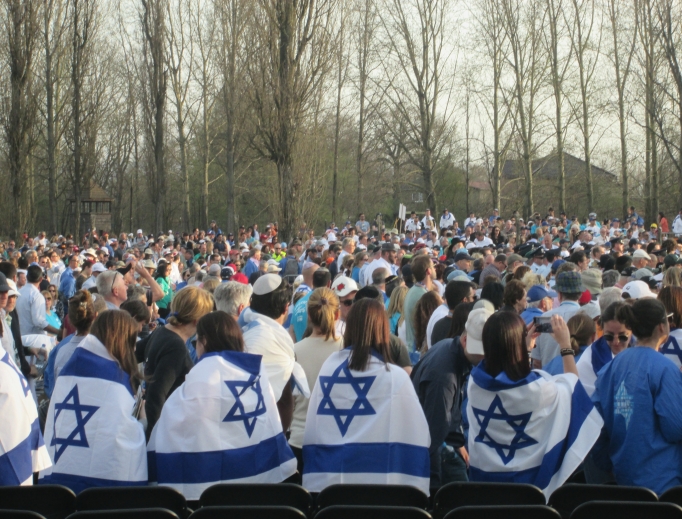 On April 12, Polish Catholics were among the 12,000 participants in the ‘March of the Living,’ a Polish-based Holocaust education program that culminates with a march from the Nazi camp of Auschwitz to Birkenau, a section of Auschwitz. During the march, many of the Jewish participants held Israeli flags or wore flags around their shoulders. Polish Catholic high-school students participated in the march. They brought signs with the English and Hebrew words of the Old Testament Priestly Blessing that begins: ‘The Lord Bless You and Keep You’ (Numbers 6:24-26). They said they wanted ‘to bless’ the Jewish people. On April 12, Polish Catholics were among the 12,000 participants in the ‘March of the Living,’ a Polish-based Holocaust education program that culminates with a march from the Nazi camp of Auschwitz to Birkenau, a section of Auschwitz. During the march, many of the Jewish participants held Israeli flags or wore flags around their shoulders. Polish Catholic high-school students participated in the march. They brought signs with the English and Hebrew words of the Old Testament Priestly Blessing that begins: ‘The Lord Bless You and Keep You’ (Numbers 6:24-26). They said they wanted ‘to bless’ the Jewish people.