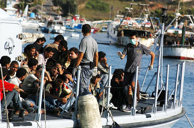 Refugees arriving in Lampedusa, Italy. Refugees arriving in Lampedusa, Italy.