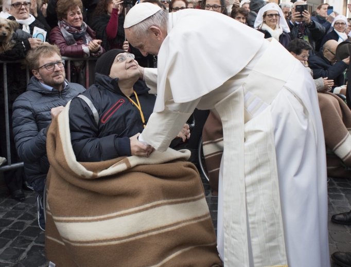 Pope Francis meets with disabled people at the Piazza di Spagna during his traditional visit to the Column of the Immaculate Conception on Dec. 8. Pope Francis meets with disabled people at the Piazza di Spagna during his traditional visit to the Column of the Immaculate Conception on Dec. 8.